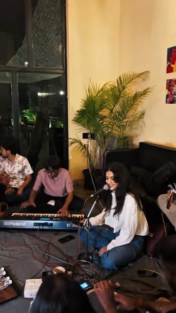 Singer and keyboard player performing live at Gully Gourmet